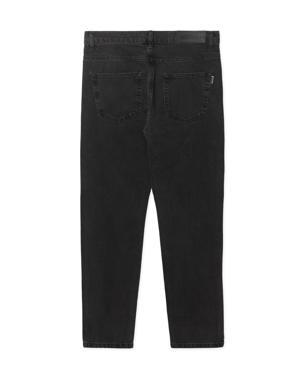 Woodbird WBDoc Crow Jeans zwart, achterkant van de tapered fit denim met subtiele vervaging en ritssluiting.